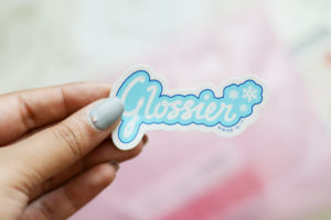Glossier sticker