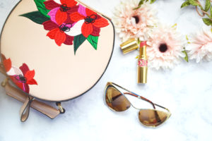 white marble flatlay, zara bag, flower crown