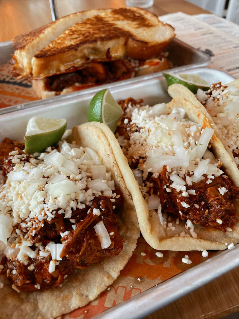 A picture of the chicken mole tacos at Muchacho ATL.