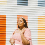 Valentine’s Day Outfit Inspiration: Pink cable knit cardigan and bralet set from River Island, white pleated tennis skirt, Gucci Woman’s rubber slide sandal